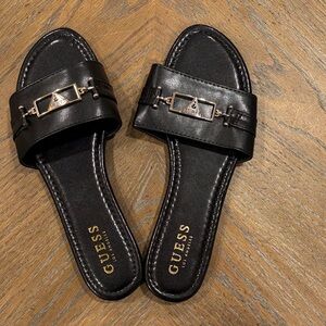 Guess Black Slide Sandals with Gold Accent